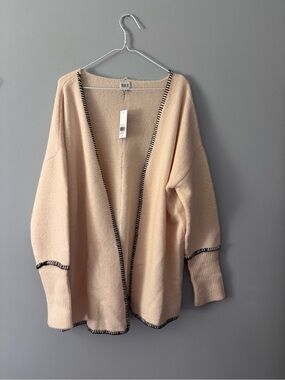 NWT BKE Cardigan Sweater. Medium. Cream with black trim.